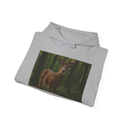 Folded gray hoodie with a deer in a forest design on a white background