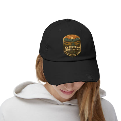 Black cap with 'KY Bluegrass Outfitters' logo worn by a person on a white background