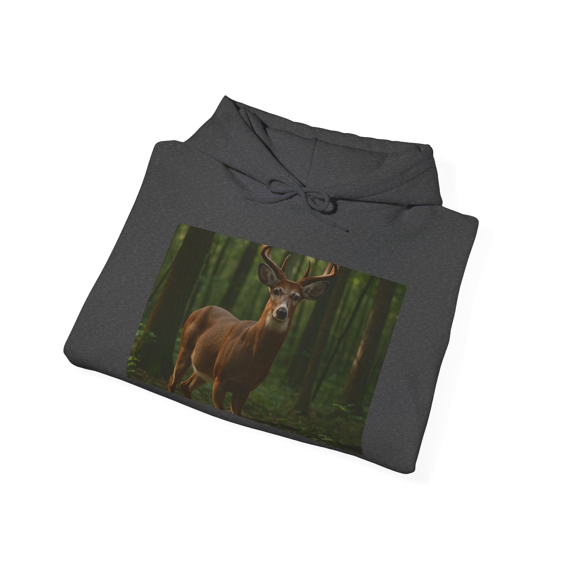 Folded dark gray hoodie with a deer in a forest design on a white background
